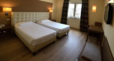 클래식 트윈룸 — Best Western Grand Hotel Guinigi